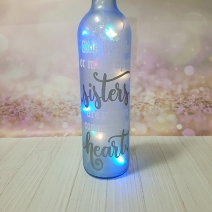 Wine bottle lamp Side by side or miles apart sisters...